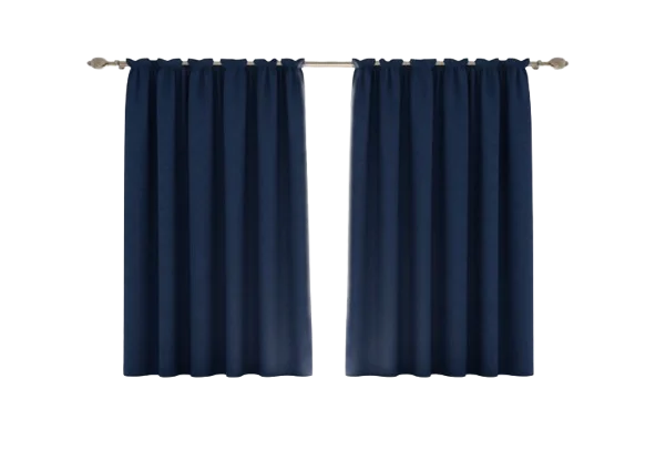 Dark navy blue blackout curtains hanging evenly on a curtain rod for modern window décor